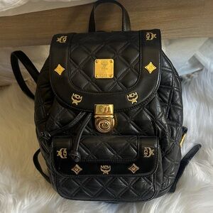 MCM Black Quilted Backpack with Gold Details